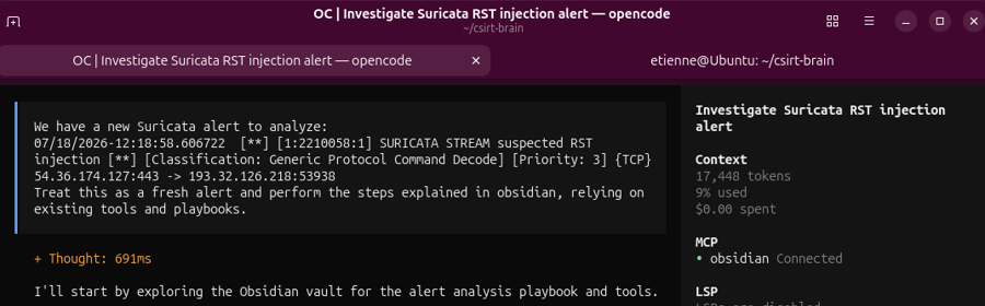 OpenCode receiving a second Suricata alert and a prompt to use existing tools and playbooks.